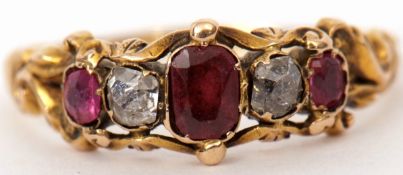 Early Victorian ruby and diamond ring, a design of three graduated oval shaped rubies and two