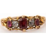 Early Victorian ruby and diamond ring, a design of three graduated oval shaped rubies and two