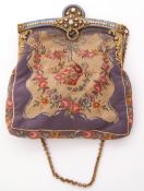 Early 20th century petitpoint evening bag with gilt metal and enamel mount and pearl type stones