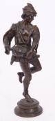 19th century bronze figure "Joueur de Vielle" in the form of a dancing musician, 49cm high