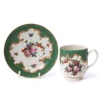 18th century Worcester cup and saucer, the apple green ground decorated to the centre with fruit