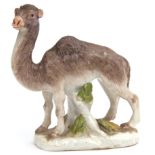 Mid-18th century Meissen model of a camel, finely painted on a leafy base, 7cm high