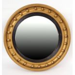 Regency period gilt and gesso circular large wall mirror with ball moulded frame and convex mirror