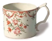 Lowestoft mug circa 1780, of unusual size, with a polychrome floral design and trifle type handle,