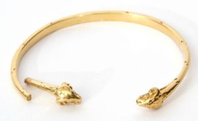Antique torc bangle featuring two rams head finials (broken), unmarked, tests for 18ct gold, 23.