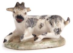 18th century miniature model of a goat on a flat leafy green base, possibly Chelsea or Bow, 7cm