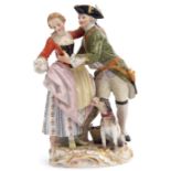 19th century Meissen group of a pair of lovers with a dog by their side on gilt scroll base, blue