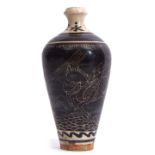 Chinese Cizhou type Meiping vase with sgraffito decoration of horses on a black pottery ground
