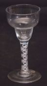 Mid-18th century wine glass with double ogee bowl above a double series air twist stem, 16cm high