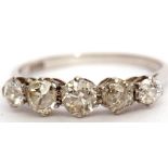 Precious metal five stone diamond ring featuring five graduated old cut diamonds, total carat weight