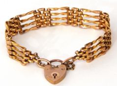 Antique 9ct stamped fancy and plain four-bar gate bracelet, heart padlock and safety chain