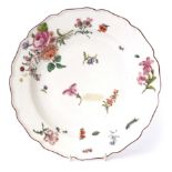 Chelsea red anchor plate decorated in Meissen style within a shaped brown line rim, 24cm diam