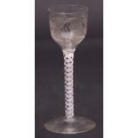 Mid-18th century wine glass, the ogee bowl engraved with a bird and fruiting vine design above an