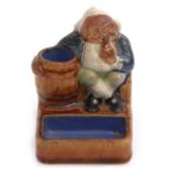 Royal Doulton mid-20th century slip cast model of a toper holding a barrel, designed by Harry