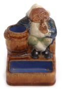 Royal Doulton mid-20th century slip cast model of a toper holding a barrel, designed by Harry