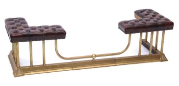 Late 19th/early 20th century adjustable club fender having brass curb and rail base, red buttoned