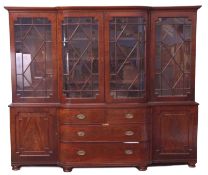 Late Georgian mahogany break front library bookcase, the top with moulded cornice above two bow