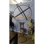 Modern weathered cast metal globe shaped pedestal weather vane with central arrow pointer, 202cm