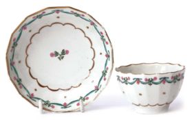 Lowestoft porcelain tea bowl and saucer circa 1780, the ribbed body decorated with the Bungay