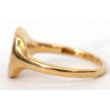 18ct gold gent's signet ring, the shaped rectangular panel with partially erased monogram, 10.