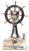 George VI novelty silver encased table lighter in the form of a rotating ship's wheel and capstan on