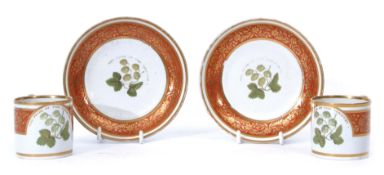 Rare pair of late 18th century Worcester (Barr) coffee cans and saucers, decorated with hops, the