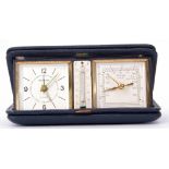 Mid-20th century leather cased folding travelling watch/thermometer/barometer combination by Europa,