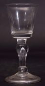 18th century wine glass or cordial glass, the funnel bowl above a baluster stem, 14cm high