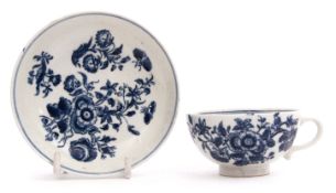 Lowestoft cup and saucer, circa 1780, of unusual shape, decorated with a floral print of three