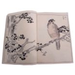 Two Japanese sketchbooks of woodblock prints, one mainly of birds and cranes in floral settings or