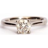 Precious metal diamond ring, a central round brilliant cut diamond of 0.71ct approx, set in a four