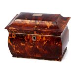Tortoiseshell tea caddy, the sarcophagus top enclosing a fitted interior with two compartments (