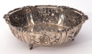 Early 20th century Continental white metal table bowl well embossed to the raised edge with panels