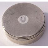 George V circular lidded box with engine turned decoration and crest to lid, engine turned sides,