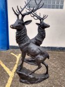 Two bronze patinated cast metal studies of stags, modern, 200cm high