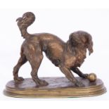 Ferdinand Pautrot (1832-1874) gilt bronze study of a spaniel dog with a ball, the base signed