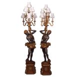 Pair of good quality reproduction seven-sconce lamp standards, the supports modelled as "Blackamoor"