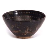 Chinese Jian ware pottery bowl with a typical brown glaze and dot design, 11cm diam