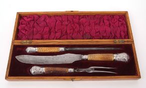 Late Victorian oak cased carving set with steel blades and silver ferrules and caps, Sheffield 1889,