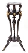 19th century ebonised and gilt metal mounted tochere stand, upper tier over a parcel gilded column