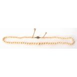 Cultured pearl necklace, a single row of graduated pearls to an old cut diamond clasp, 22cm