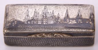 Mid-19th century Russian silver and niello work snuff box of chest form, the lid and base with
