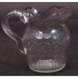 Late 18th century/early 19th century cut glass water jug, probably Irish, with diamond design around