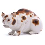 Rare Meissen model of a crouching cat with light and dark brown markings, probably 19th century,