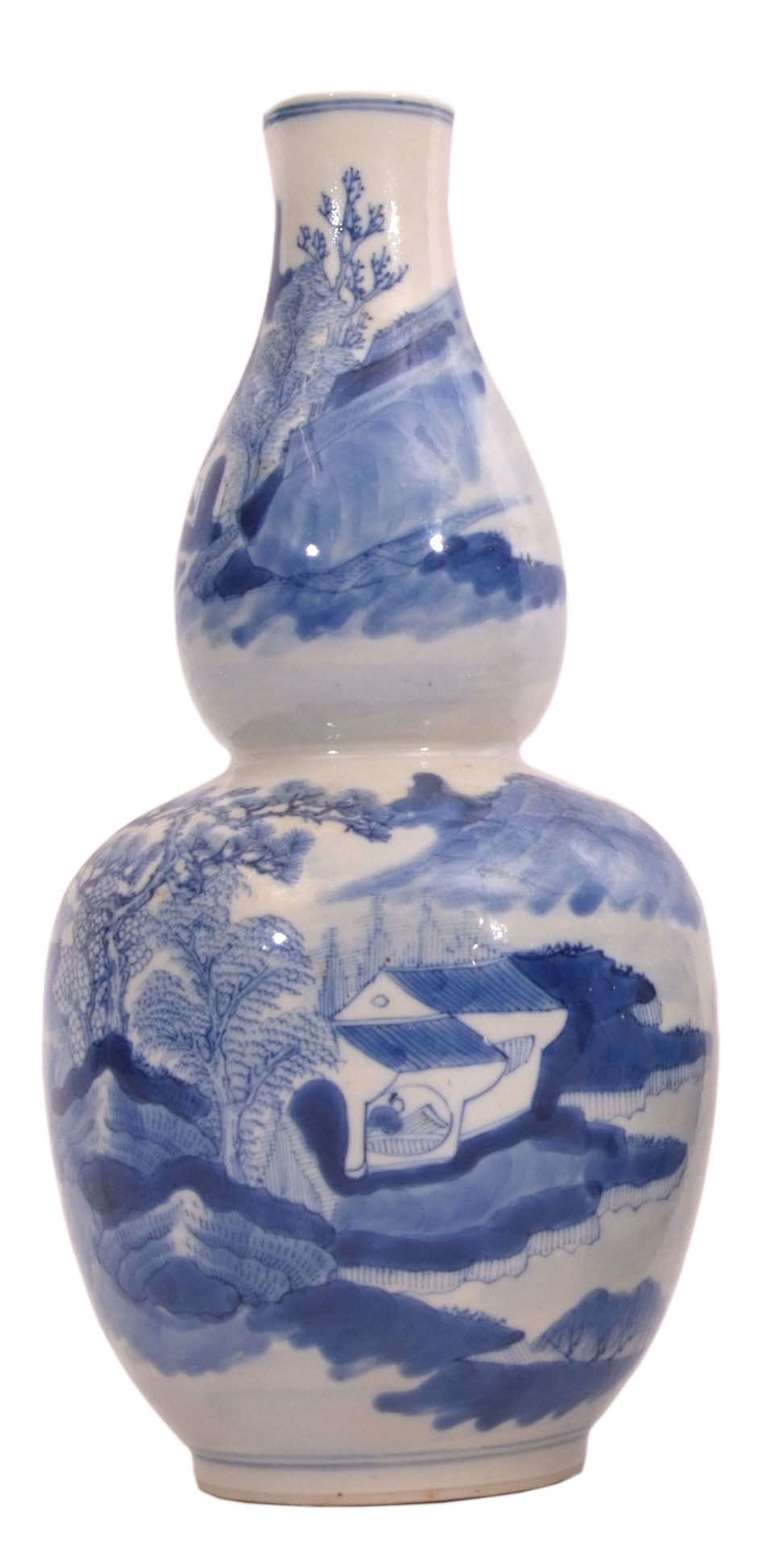 19th century Chinese double gourd vase decorated with a blue and white landscape scene