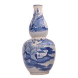 19th century Chinese double gourd vase decorated with a blue and white landscape scene