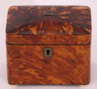 Small blonde tortoiseshell tea caddy, the lid with white metal stringing and central name plate over