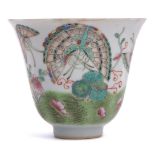 Chinese porcelain beaker decorated in a famille vert palette with flowers and butterflies, 8cm high