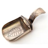 George III caddy spoon with prick engraved curved handle, the shovel shaped bowl prick engraved with
