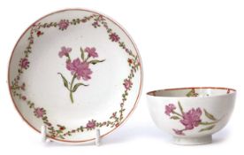 Lowestoft porcelain tea bowl and saucer circa 1780, decorated with the carnation pattern, saucer